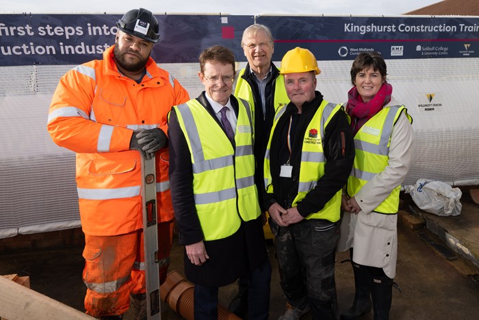 Mayor Andy Street, Cllr Ian Courts and Cllr Karen Grinsell with a learner, Nathan, and a tutor at Kingshurst Construction Training Hub.