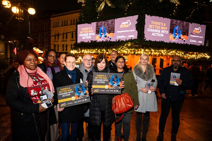 Andy Street, Mayor of the West Midlands and chair of the West Midlands Combined Authority, and Cllr Jayne Francis, Birmingham City Council's cabinet member for housing and homelessness, with representatives from local charities that support homeless people.