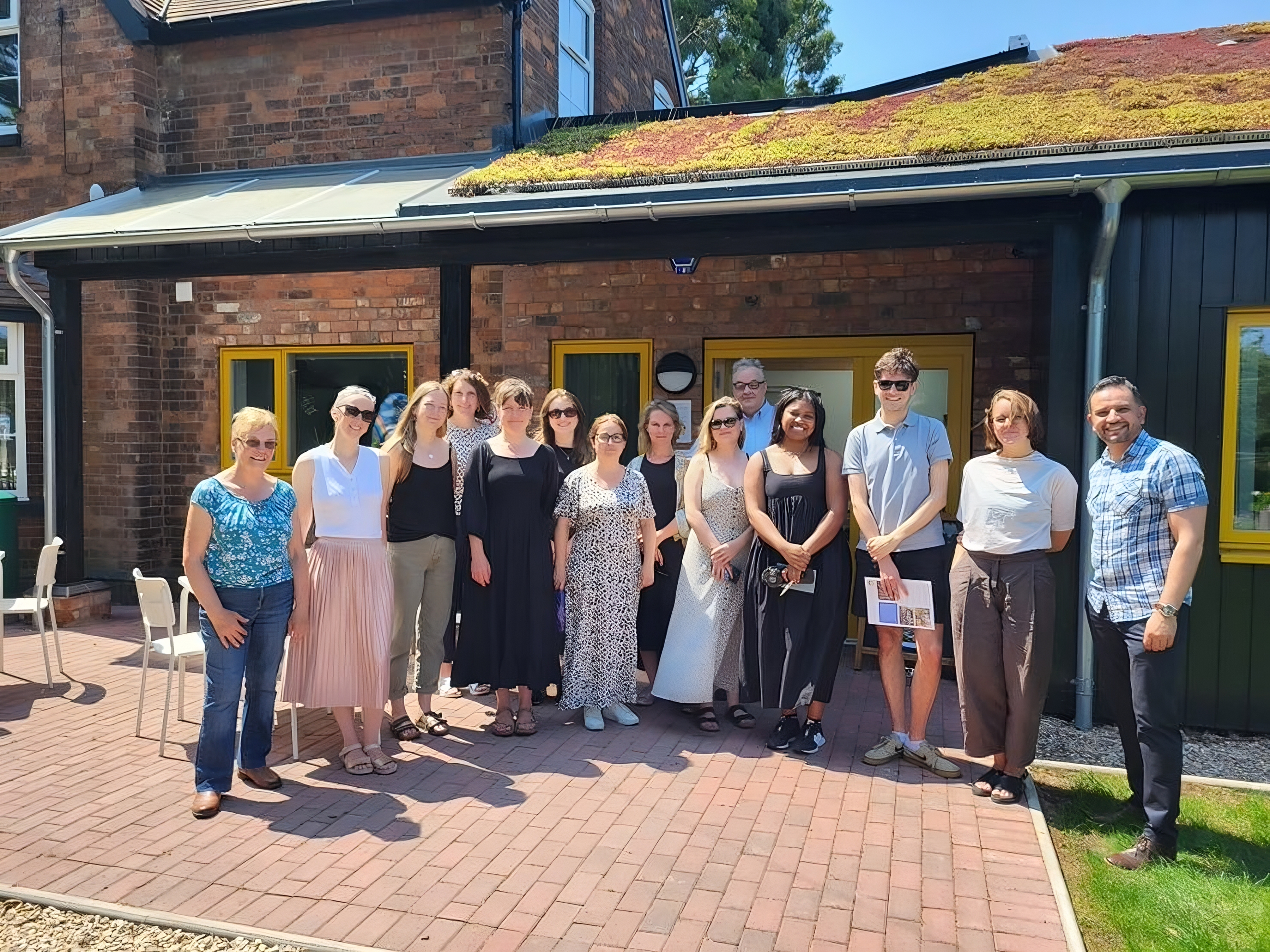 Linda Hines, chair of trustees at Witton Lodge Community Association, left, and Afzal Hussain, chief officer, right, with representatives of the Power to Change, who form the first cluster of social businesses as part of the West Midlands Combined Authority's Social Economy Growth Programme.