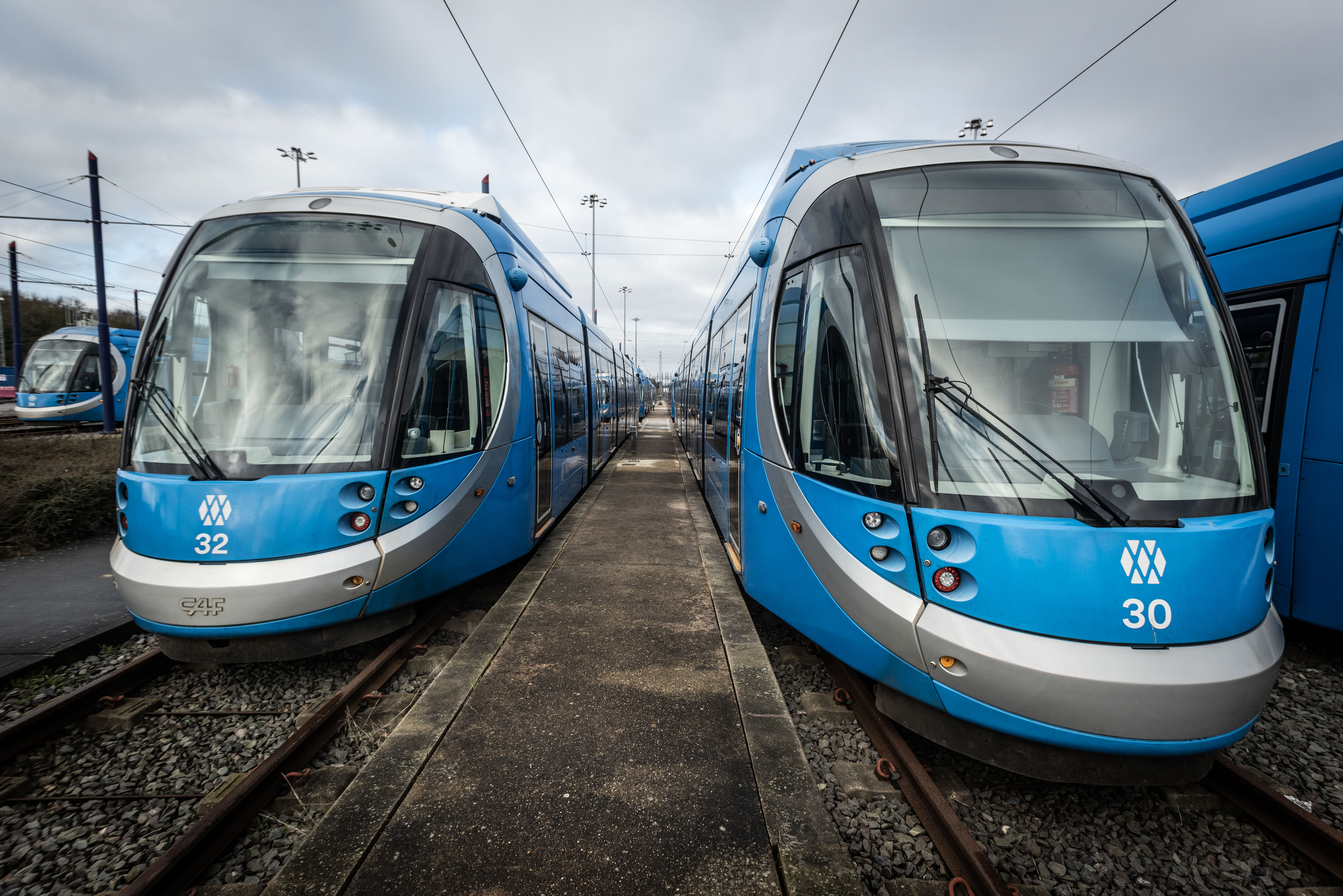 Two West Midlands Metro trams parked at the depot