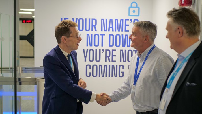 From L-R: Andy Street, Mayor of the West Midlands, shaking hands with Charlie Blakemore, group managing director of Intercity, and Martin Ward, the WMCA's tech commissioner.