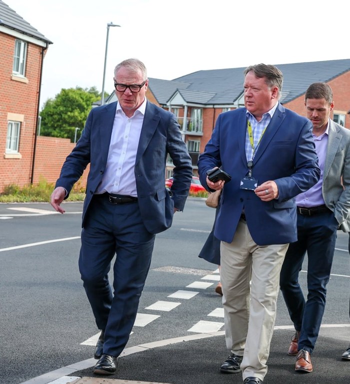 (l-r) Mayor Richard Parker with Gary Fulford, whg's group chief executive and Stuart Penn, Lovell's managing director central region, at the Lockside development in Walsall, the result of a previous collaboration between the three partners