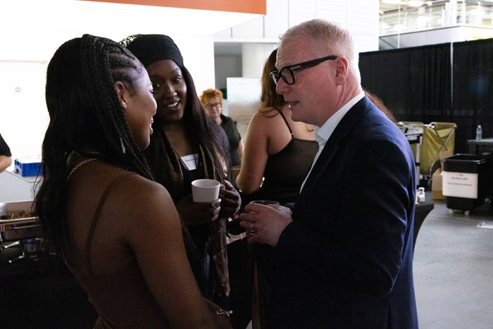 Mayor Richard Parker speaking to student from Walsall Studio School Taisiya-Le Hazell and her mum about the screenwriting project