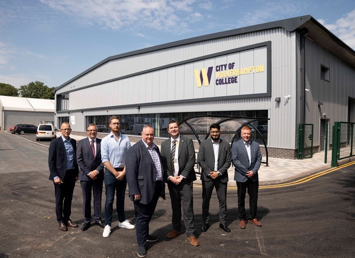 (L-R): Luke Pardoe, Turner & Townsend Associate Director; Jonathan Astley, The Astley Partnership Architect; Cllr Chris Burden, City of Wolverhampton Council Cabinet Member for City Development, Jobs and Skills; Councillor Stephen Simkins, City of Wolverhampton Council Leader; Peter Merry, City of Wolverhampton College Deputy Chief Executive; Ravi Verma, Turner & Townsend Project Manager; and Rob Lashford, Speller Metcalfe Regional Director, in front of the new Advanced Technology and Automotive Centre