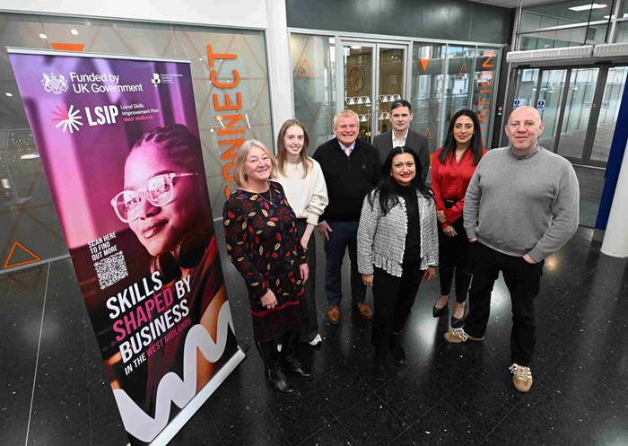 Pictured: Stakeholders in the West Midlands LSIP standing by a banner