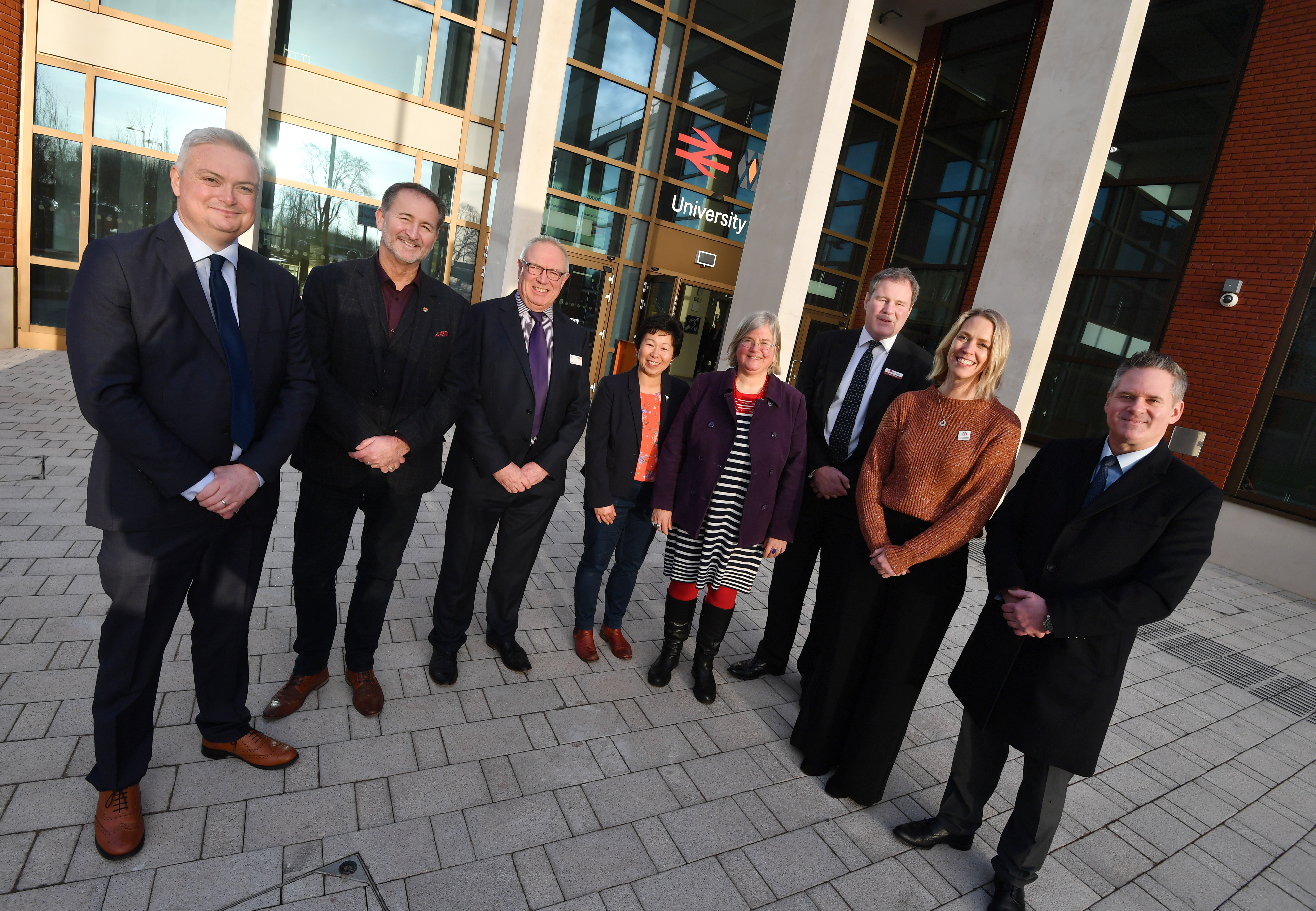 A line up of representatives of the key partners involved in the new station development