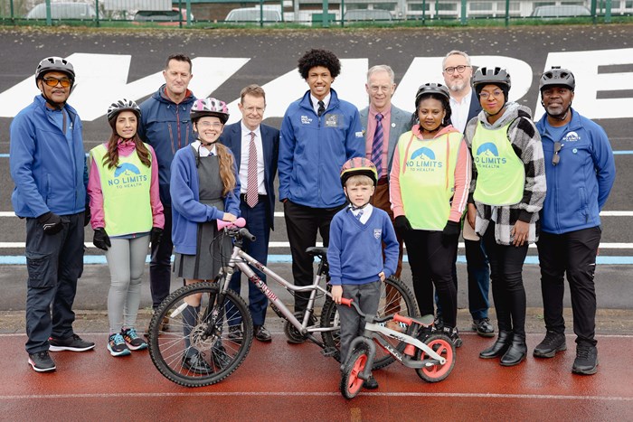 Dean Hill from Sport England, Mayor Andy Street, velodrome campaigner David Viner, Adam Tranter, the Mayor’s cycling and walking commissioner with cyclists Al Campbell, Harby Duggal, Street, Kristian Larigo, Tracy McLean, Chrystal Campbell, Sam Henry, Scarlett and Noah, front, at Halesowen Athletic and Cycling Club.