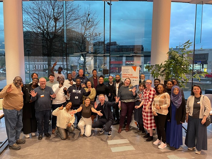 A group shot of people starting on a training programme to help grow their Social Enterprise