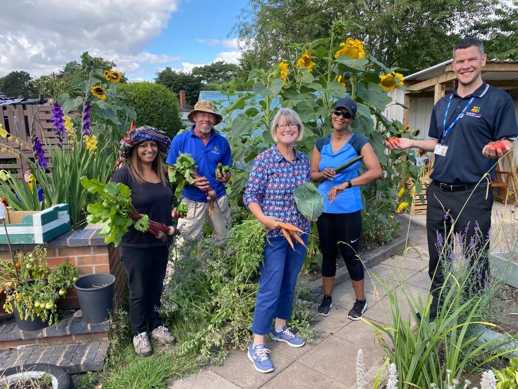 Volunteers and staff from The Dorothy Parks Centre in Smethwick in their allotment