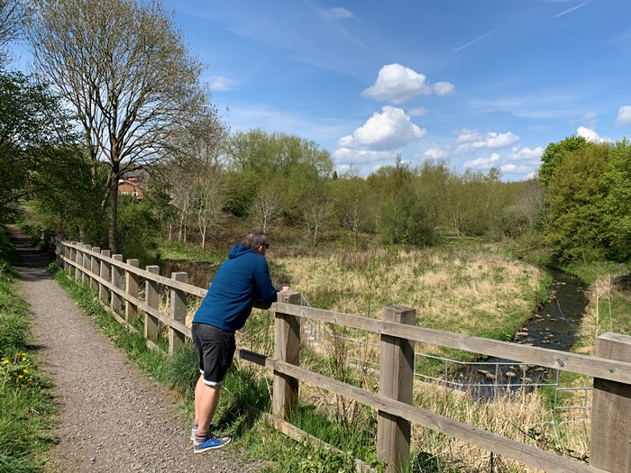 Howell's staff member taking a break at Mouseweet Brook.