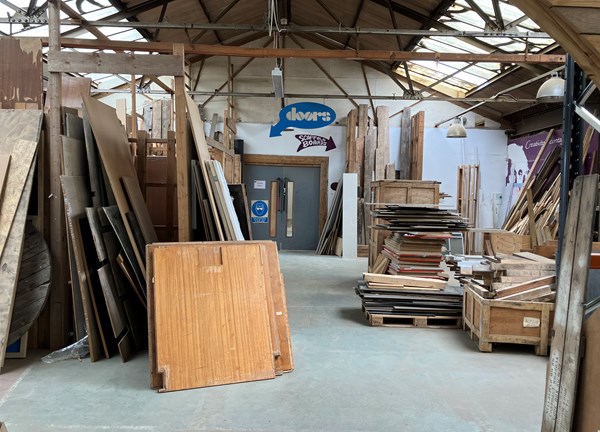 A warehouse full of wooden planks