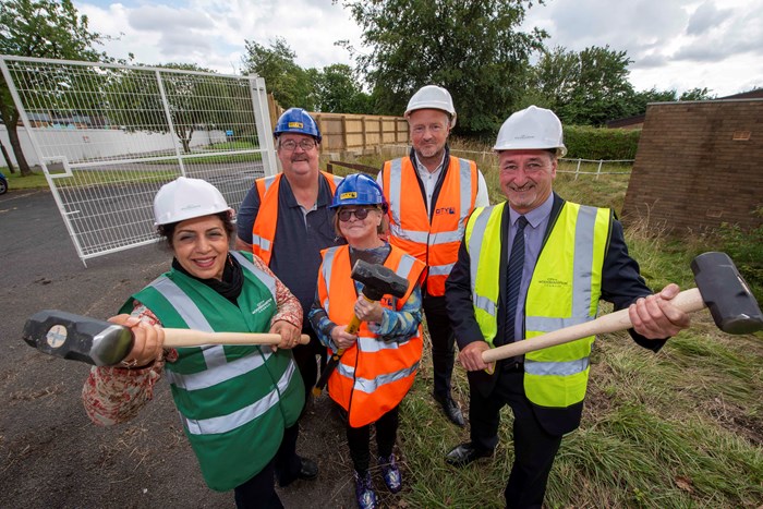 Councillor Jasbir Jaspal, Cabinet Member for Adults and Wellbeing, Andrew Slater, Chair of Patient Participation Group, Tracy Dunne, Rakegate Tenants and Residents Association, Paul Macrae, Associate Director City Demolition, and Councillor Steve Evans, Cabinet Member for City Housing and WMCA Housing and Land Board member, at the Oxley Day Training Centre demolition site