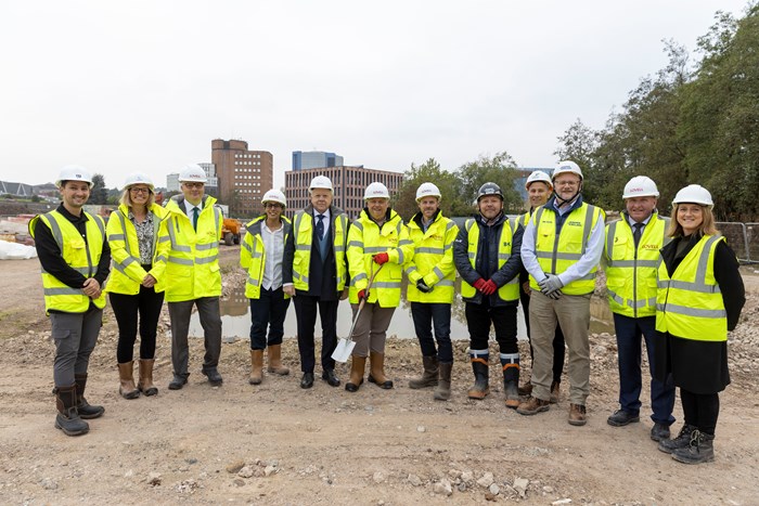 ¬¬Photo: Councillor Richard Overton, centre, Telford & Wrekin Council’s Deputy Leader and Cabinet Member for Highways, Housing and Enforcement, with representatives from the WMCA, Bowmer & Kirkland, Lovell Partnerships, Genr8 Kajima, Gleeds and Telford Towns Fund Board at the Station Quarter residential site.