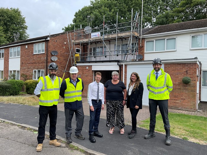 Ross Jago, project manager at Vinci; Paul Richards, group director of customer and communities at Orbit, Andy Street, Mayor of the West Midlands and WMCA chair; Caroline Davies; Jeanette Hodges, head of carbon and operations at Orbit; Westley Brunt, sector manager at Vinci.