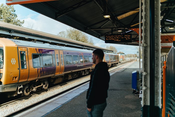 A railway station, platform and train