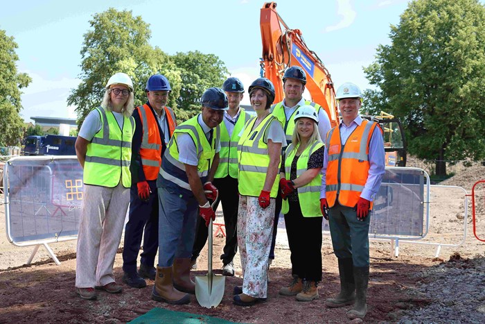 Front left Cllr Councillor Naeem Akhtar, Cabinet Member for Housing and Communities at Coventry City Council gets construction underway alongside project partners