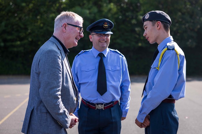 Richard Parker, Mayor of the West Midlands meets Flight Sgt Derryck Swann-Flint under the watchful eye of Flying Officer Richard Smith RAFAC