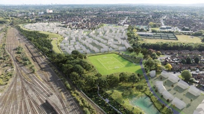 Aerial photo of the green Friar Park site with computer images overlaid showing extent of the housing
