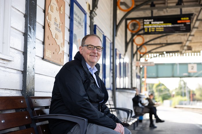 Andy Poole waiting for his train to work