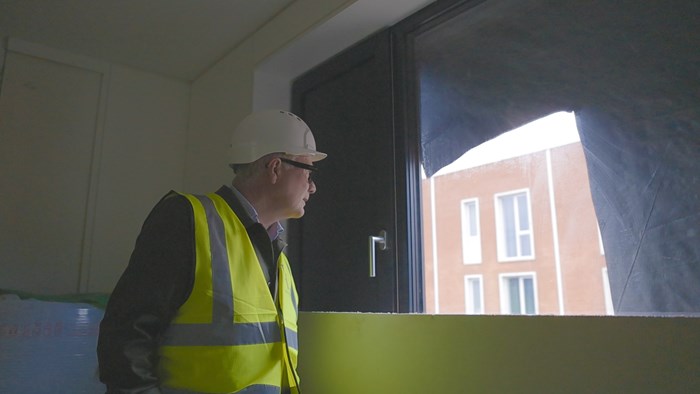 Mayor Richard Parker inside one of the new social homes under construction at Port Loop, Birmingham