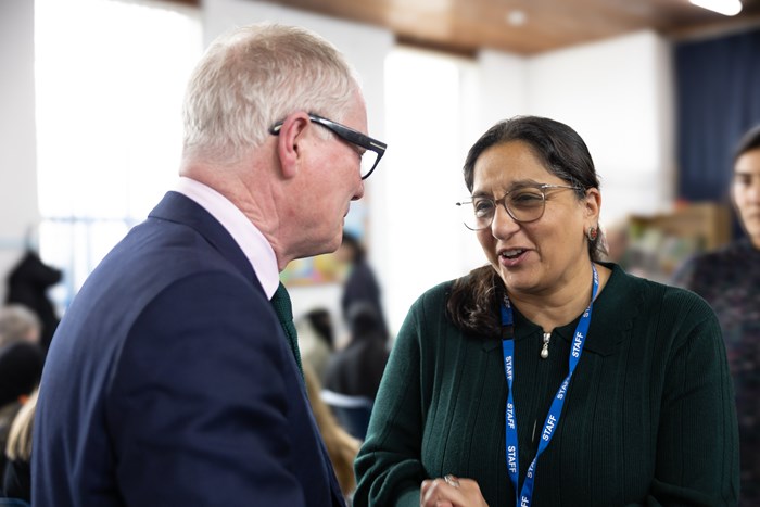 Richard Parker speaking with A'isha Khan, CEO at Aaina Community Hub