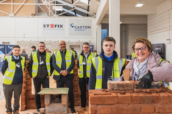 Left to right: Chloe Yafi, (Quality Manager, Caxton Builders), Ian Knight (Managing Director, Caxton Builders), Deepak Chavda (Regional Social Value Manager, St Joseph Homes), Chris Bellamy (Managing Director, Caxton Builders), Kian Hannah (Apprentice, Caxton Academy), Helene Dearn (Director of Employment, Skills, Health and Communities, West Midlands Combined Authority).