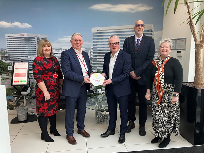 Mayor Richard Parker (centre right) with Alan Richards, DENSO’s managing director, Michelle Evans, HR manager, Graham West, engineering director and Jenny Duggan, Thrive at Work lead (Coventry City Council).