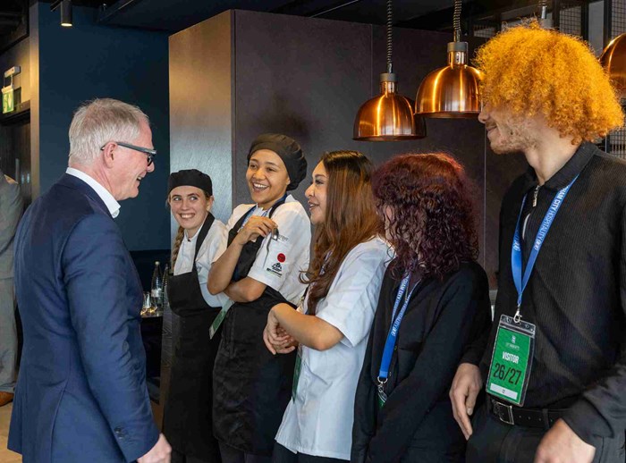 Richard meeting Compass Group UK & Ireland apprentices in the hospitality suite at Birmingham City Football Club