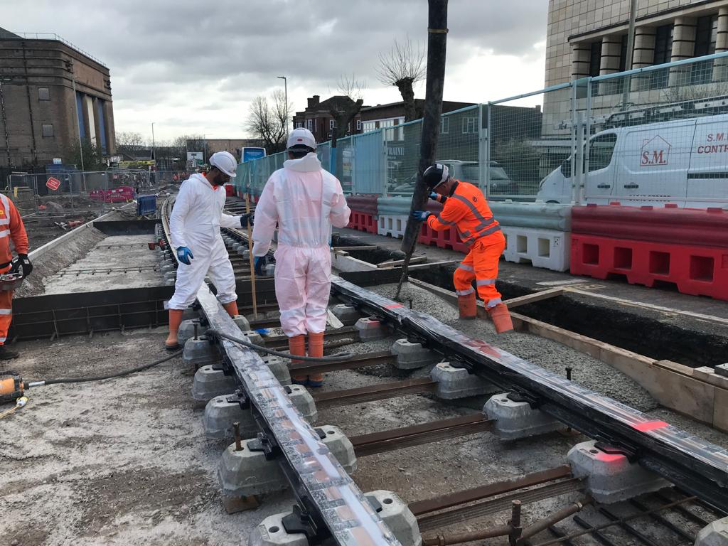 Metro Construction workers laying the track in Dudley town centre