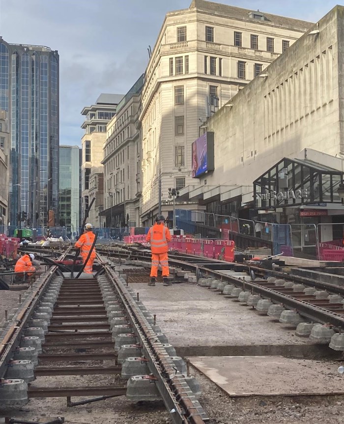Construction crews fixing the Metro track on Lower Bull Street