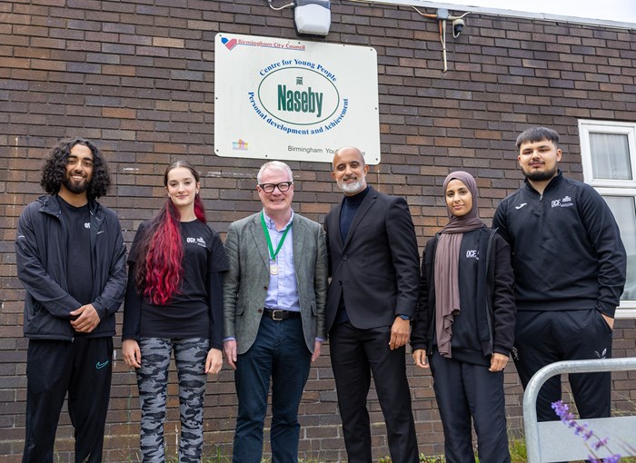 Richard Parker, Mayor of the West Midlands, with Our Commnuity Foundation apprentice Haider Bashir, youth worker Tiana Barnes, founder and chief executive Basharat Dad, youth mentor Teyaba Kauser and youth development officer Zain Khan.
