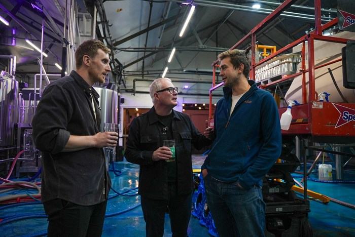 Mayor Richard Parker with Sam Back and Oli Hurlow, founders of Attic Brew Co in Stirchley, Birmingham.