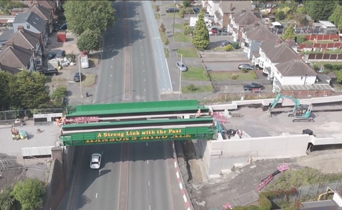 The bright green Hanson's Ale Bridge in Tipton on the unfinished tramway