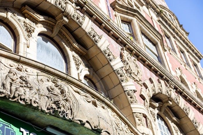 Some of the ornate carvings on the façade of the Murdoch and Pitman Building