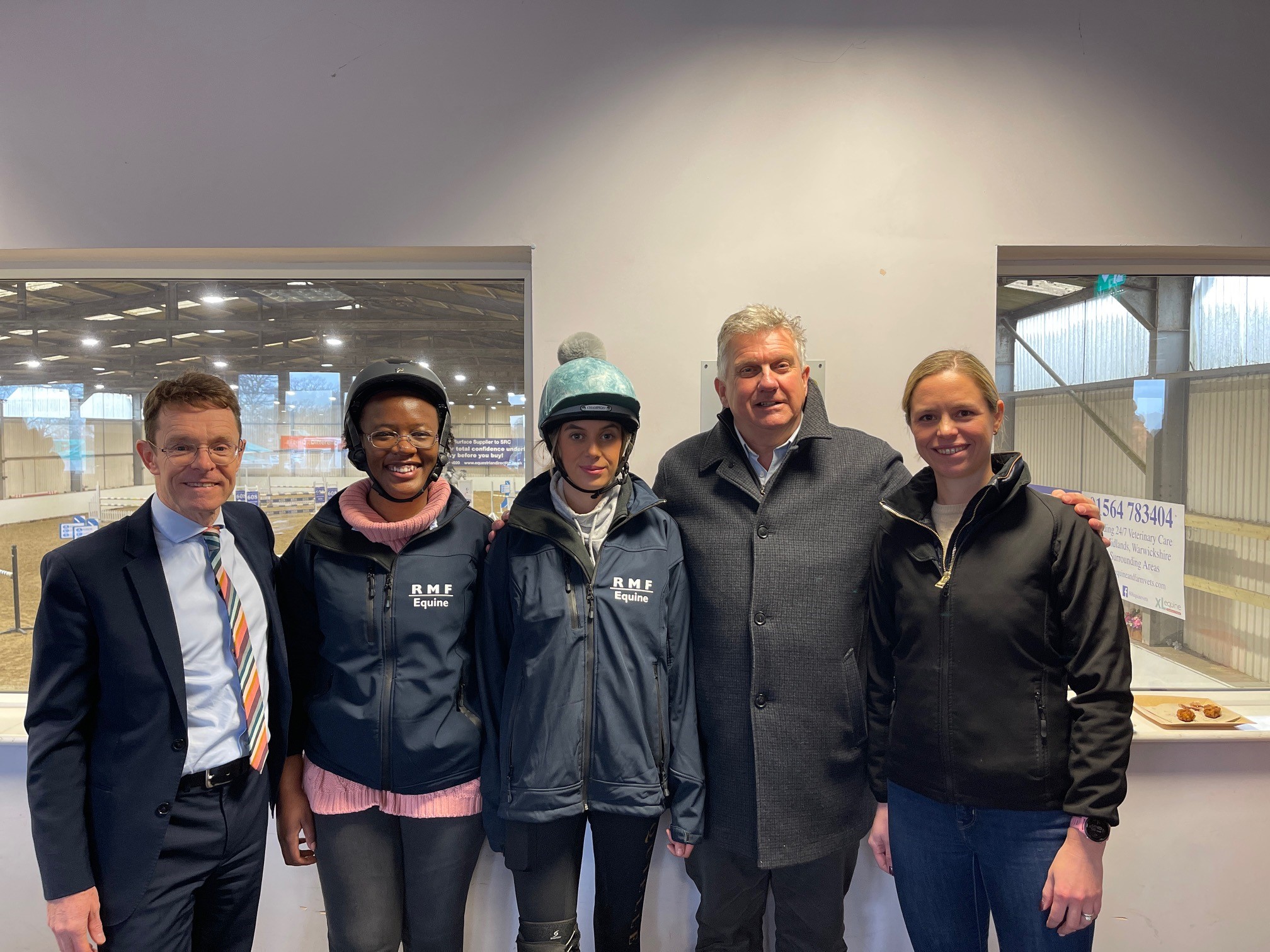 Image (L-R): Andy Street, Mayor of the West Midlands, alongside learners Hadiya Webster and Emily Kirk, Milton Harris from Milton Harris Racing and Ellie Spelman from Solihull Riding Club.