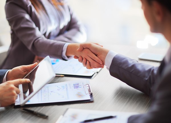 Bigstock Business People Shaking Hands 83445530