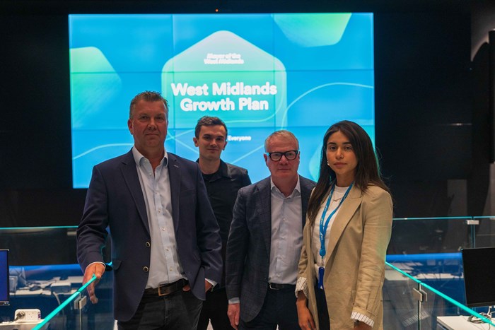 Mayor Richard Parker (second right) and Dan Cartter, SCC's director of innovation (left) with Rose Palacios and Callum Woodford, who are AI and innovation consultants at the global headquarters of IT service provider SCC.