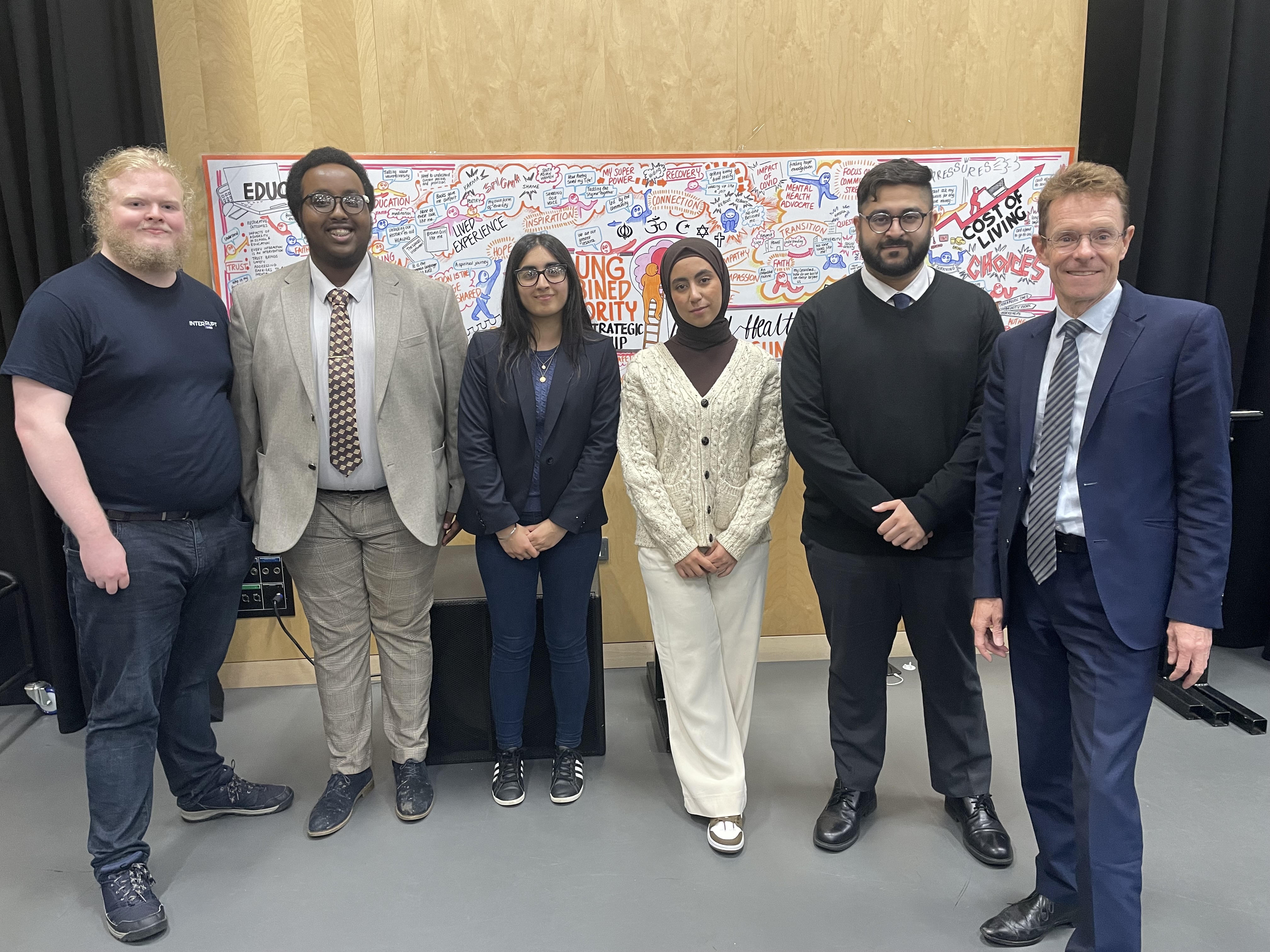 Left to right: Richard Barlow, Hamaam Shire, Simren Johal, Liv Omar, Talha Ikhlaq and Andy Street, Mayor of the West Midlands and WMCA chair, at the YCA Mental Health Summit in July 2023