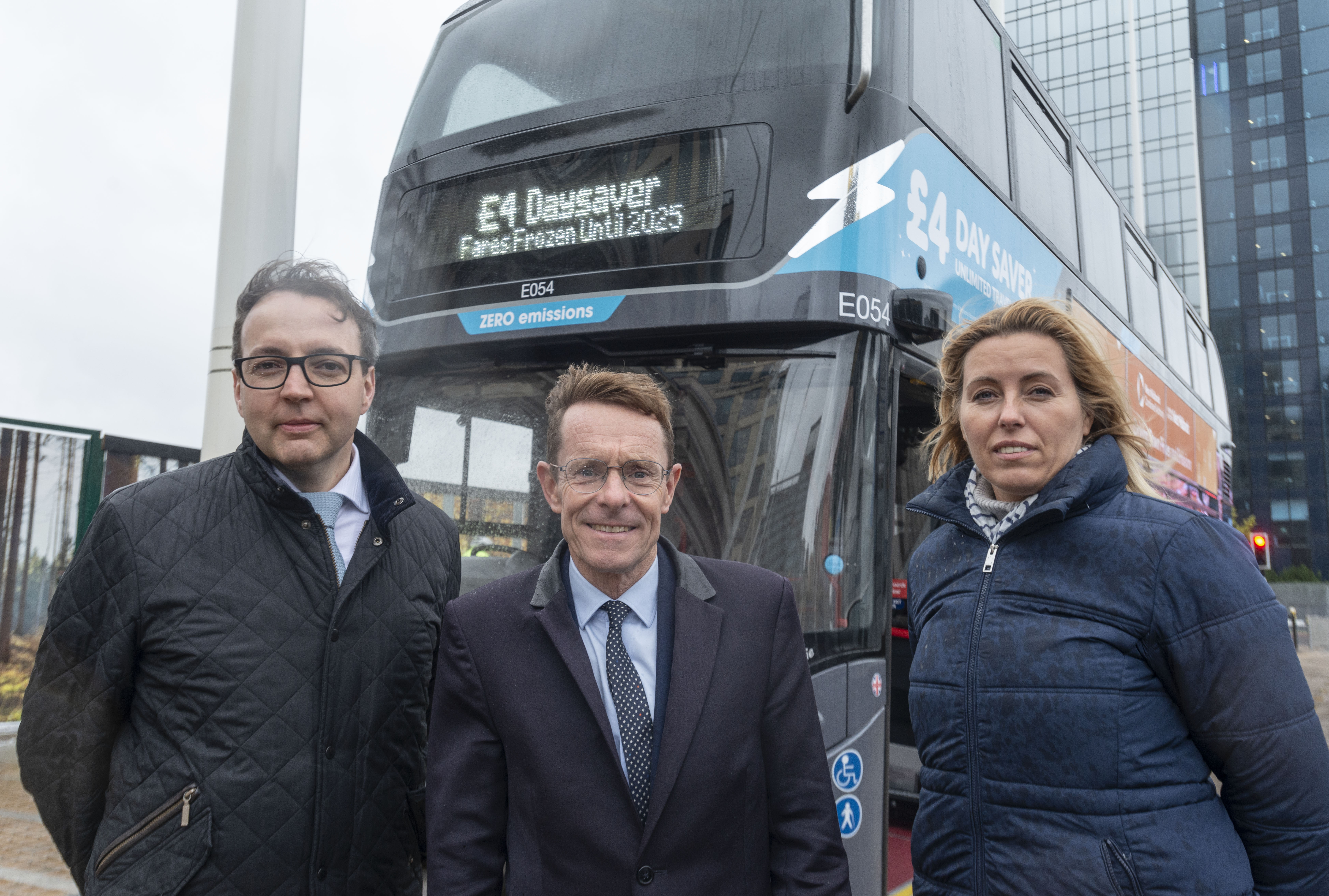 David Bradford, managing director National Express West Midlands, Mayor of the West Midlands Andy Street and Agata Litwinowicz-Soltysiak, zero emission operational manager with National Express in front of a new electric bus